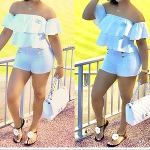 All white two piece shorts set. Very stretchy
